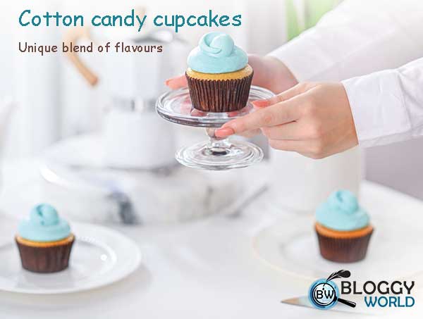 cotton candy cupcakes Fluffy rainbow cotton candy flavored swirl on a moist vanilla cupcake in layers bakeshop with affordable prices