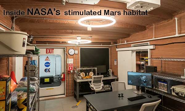 inside of the NASA stimulated Mars habitate four crew members exit mock mars mission