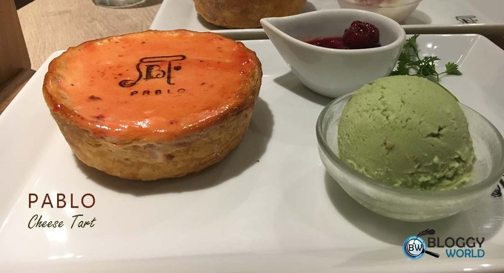 pablo cheese tart served with ice cream and fruit sauce best cheese tart by pablo osaka japan