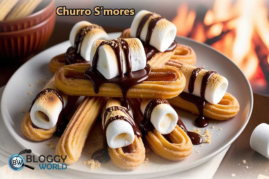 Churros topped with marshmallows, chocolate, and crushed graham crackers in a campfire-inspired setting image pesented by bloggy world