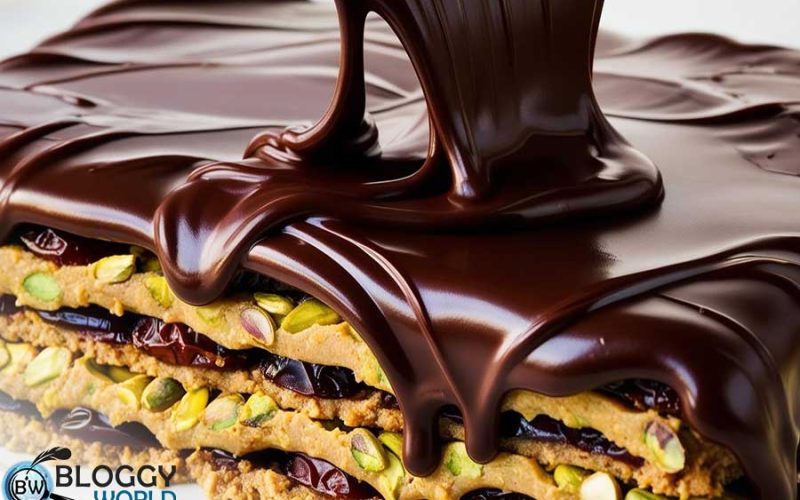 date pistachio kunafah layers being covered with chocolate image presented by bloggy world