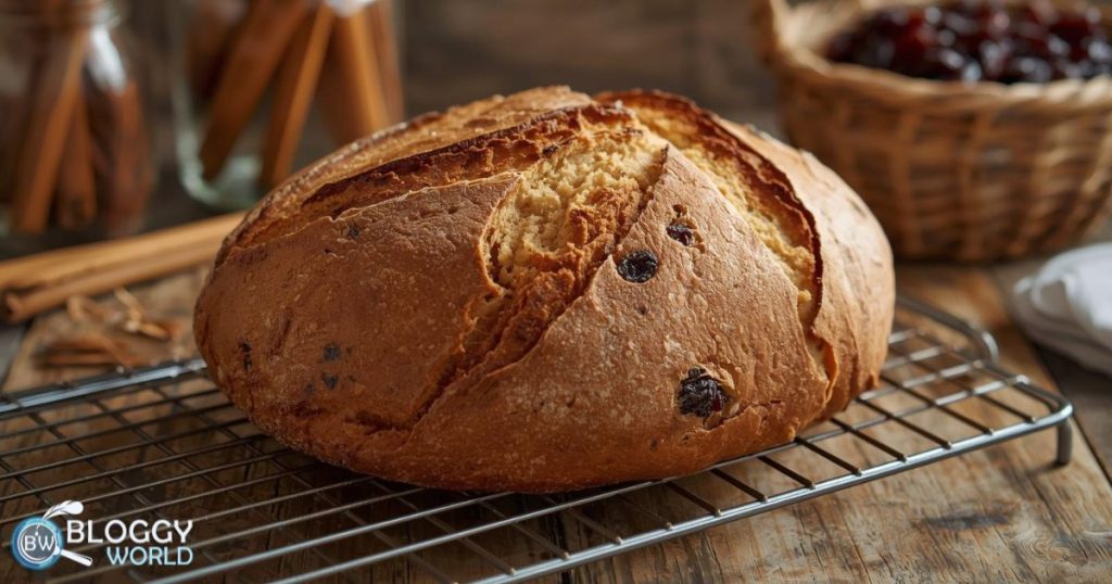 Freshly baked cinnamon raisin sourdough on a rack